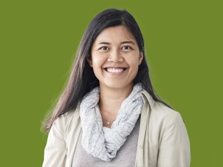 Smiling woman with long brown hair
